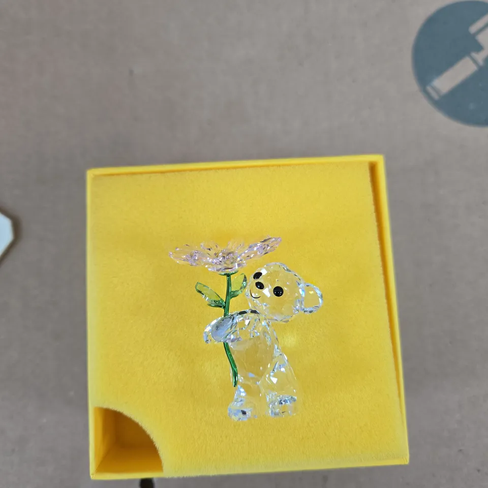 SWAROVSKI CRYSTAL BEAR ORNAMENT WITH FLOWER – BOXED