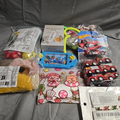 TOTE OF APPROX 10 ASSORTED TOYS AND GAMES TO INCLUDE HOT WHEELS, BATH TOYS AND CARD GAMES