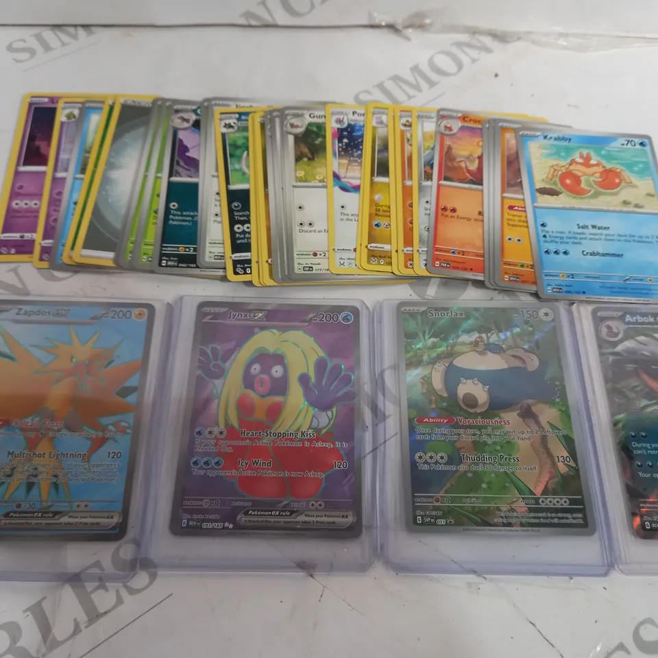 BAG OF APPROX 25 COLLECTABLE POKEMON TRADING CARDS