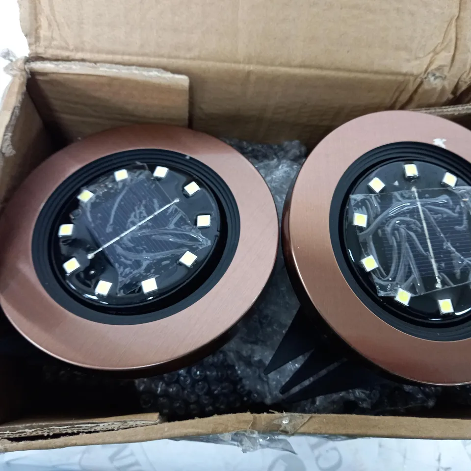 BELL & HOWELL SET OF APPROXIMATELY 5 SUPERBRIGHT SWIVEL SOLAR DISC LIGHTS