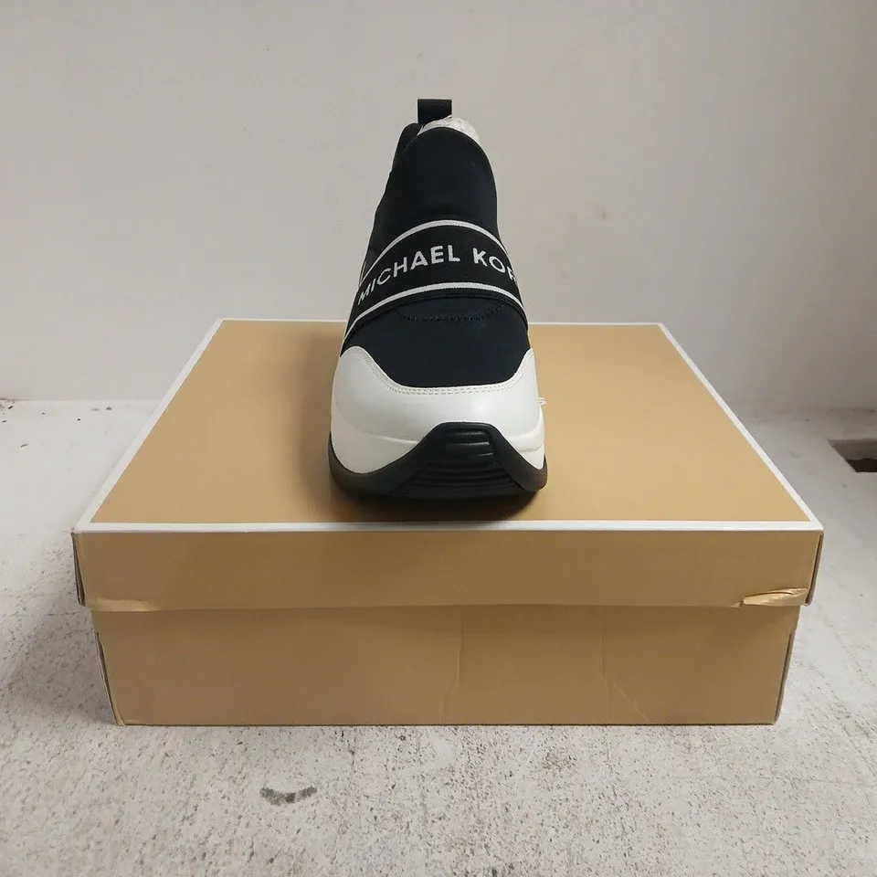 BOXED PAIR OF MICHAEL KORS OLYMPIA SLIP-ON SHOES IN BLACK/WHITE SIZE US 10M