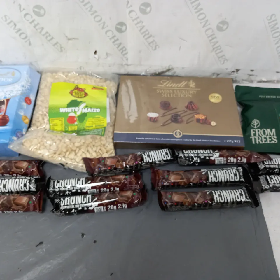 APPROXIMATELY 8 ASSORTED FOOD ITEMS TO INCLUDE - LINDOR ASSORTED, LINDT SWISS LUXURY SELECTION, AND WHITE MAZE ETC. 