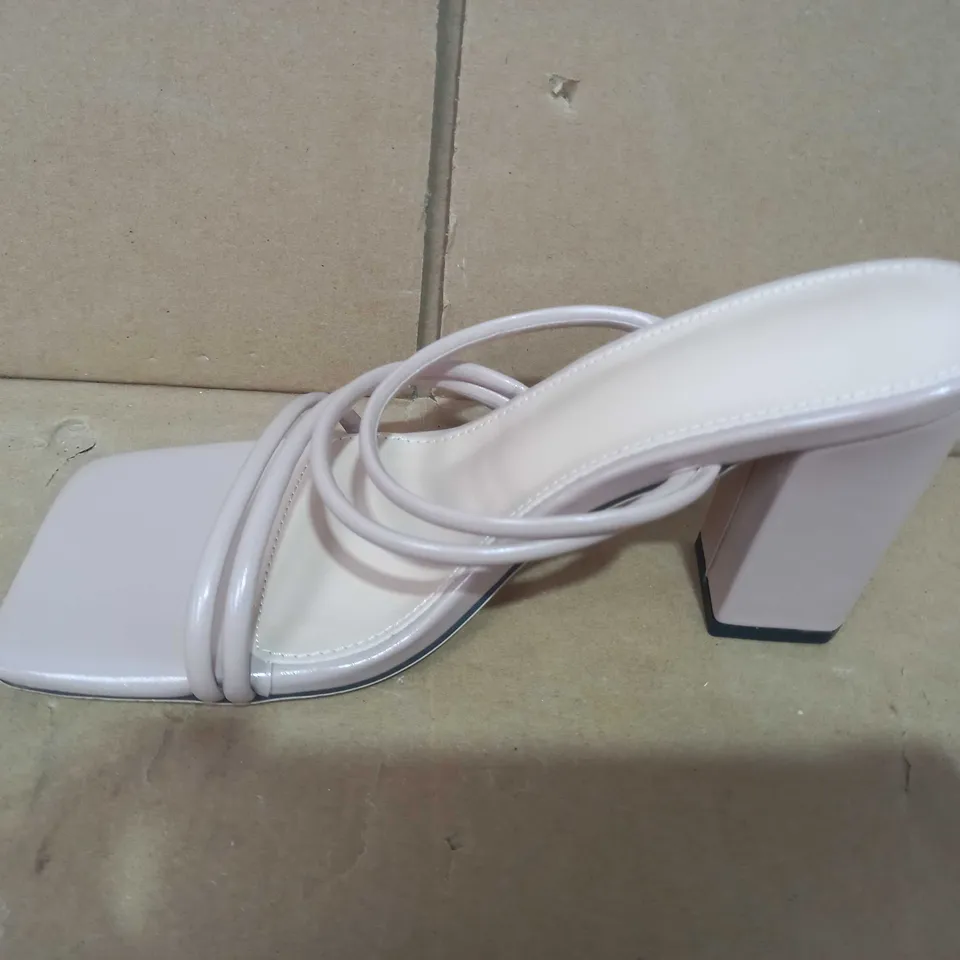BOXED PAIR OF DESIGNER HEELS IN NUDE COLOUR EU SIZE 37