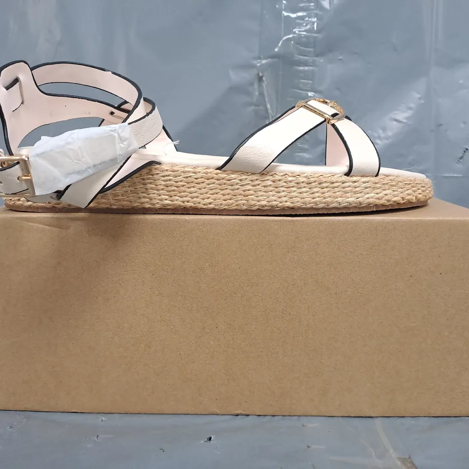 BOXED PAIR OF WHERE'S THAT FROM OPEN TOE FLAT STRAPPY SANDALS IN CREAM SIZE UK 5