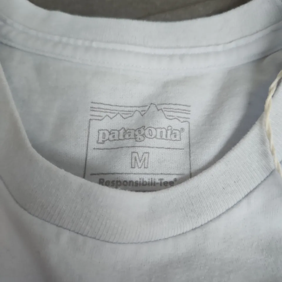 PATAGONIA WHITE T-SHIRT – LOGO BACK GRAPHIC, SIZE M