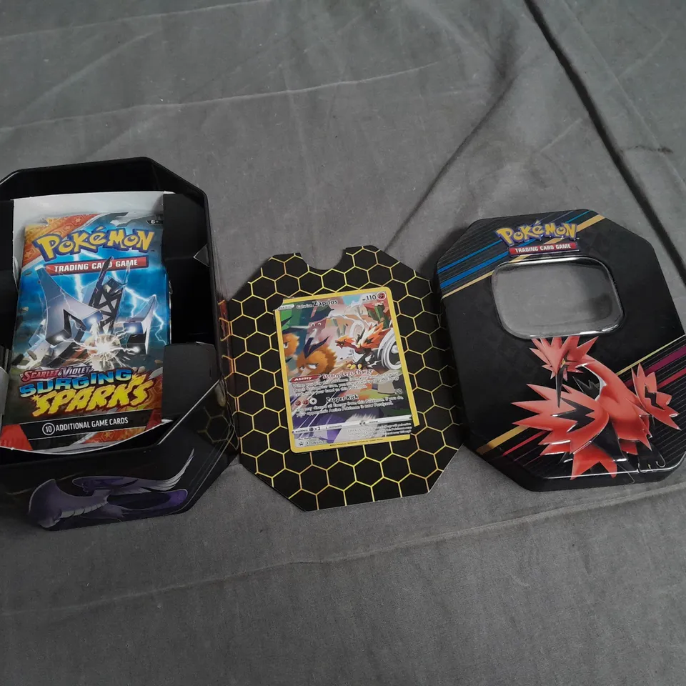 POKEMON TRADING CARD GAME TIN WITH ZAPDOS CARD AND THREE UNSEALED PACKS 