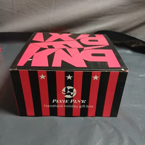 PIXIE PINK HAND-HELD HOLIDAY GIFT BOX – 72-COLOUR EYESHADOWS, 8-COLOUR GLITTER, 3-COLOUR BLUSH, 2-COLOUR COMPACT POWDER, 1-COLOUR EYEBROW PENCIL, NAIL FILE & 4 APPLICATORS