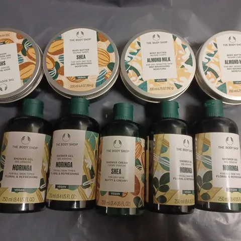 LOT OF 9 ASSORTED BODY SHOP ITEMS INCLUDES SHOWER GELS AND BODY BUTTER