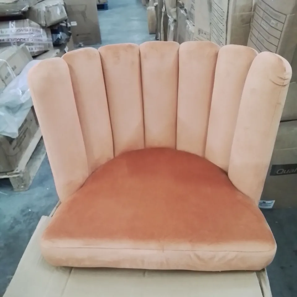 A BOXED ORANGE VELVET CURVED BACK CHAIR