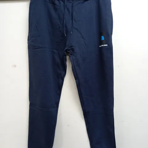 THE NORTH FACE TRACKSUIT BOTTOMS IN NAVY - XL