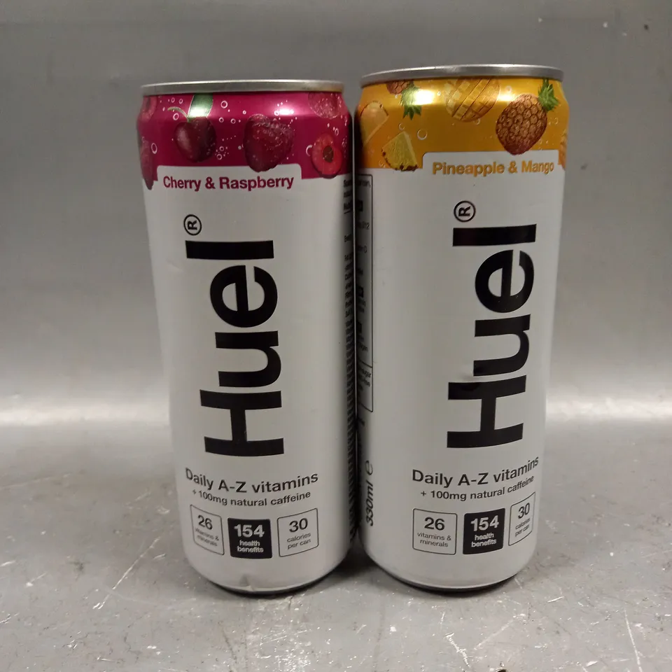 APPROXIMATELY 10 HUEL MULTI VITAMIN DRINKS IN CHERRY RASPBERRY & PINEAPPLE MANGO - COLLECTION ONLY 