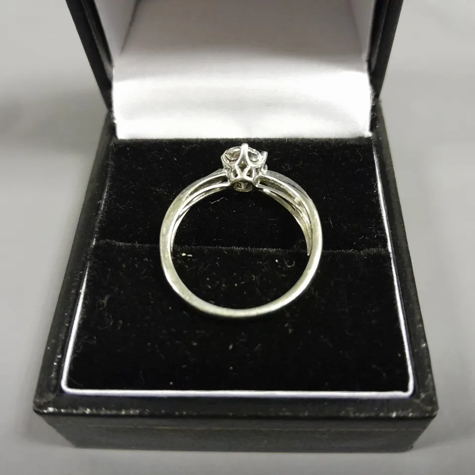 9CT WHITE GOLD RING WITH NATURAL DIAMOND HALO AND TWIST SHOULDERS