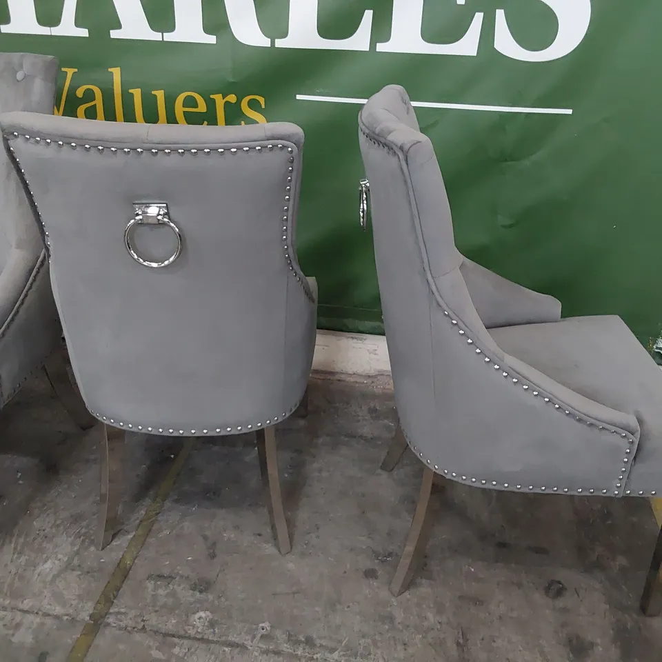 SET OF FOUR UPHOLSTERED BUTTONED RING BACK DINING CHAIRS STUDDED DETAIL ON SILVER LEGS