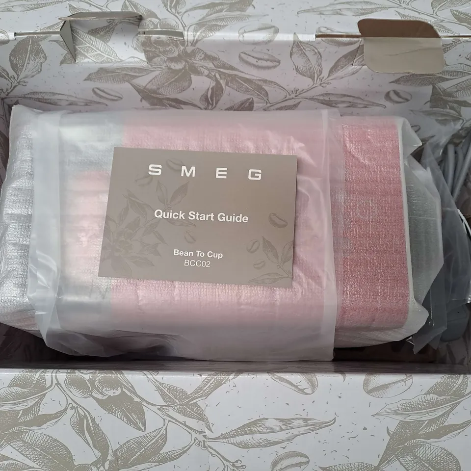 BOXED SMEG BEAN TO CUP COFFEE MACHINE IN RED