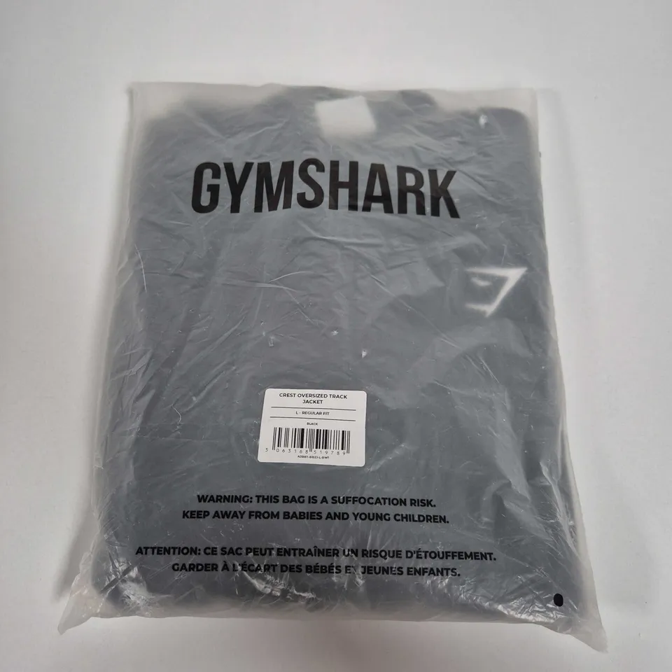 GYMSHARK CREST OVERSIZED TRACK JACKET - BLACK, SIZE L (REGULAR FIT)
