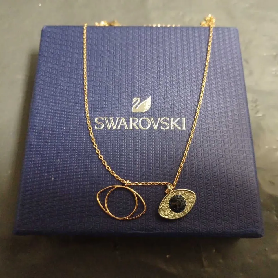 BOXED SWAROVSKI WOMENS EVIL EYE PENDANT 