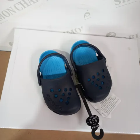 BOXED PAIR OF CROCS SIZE C5