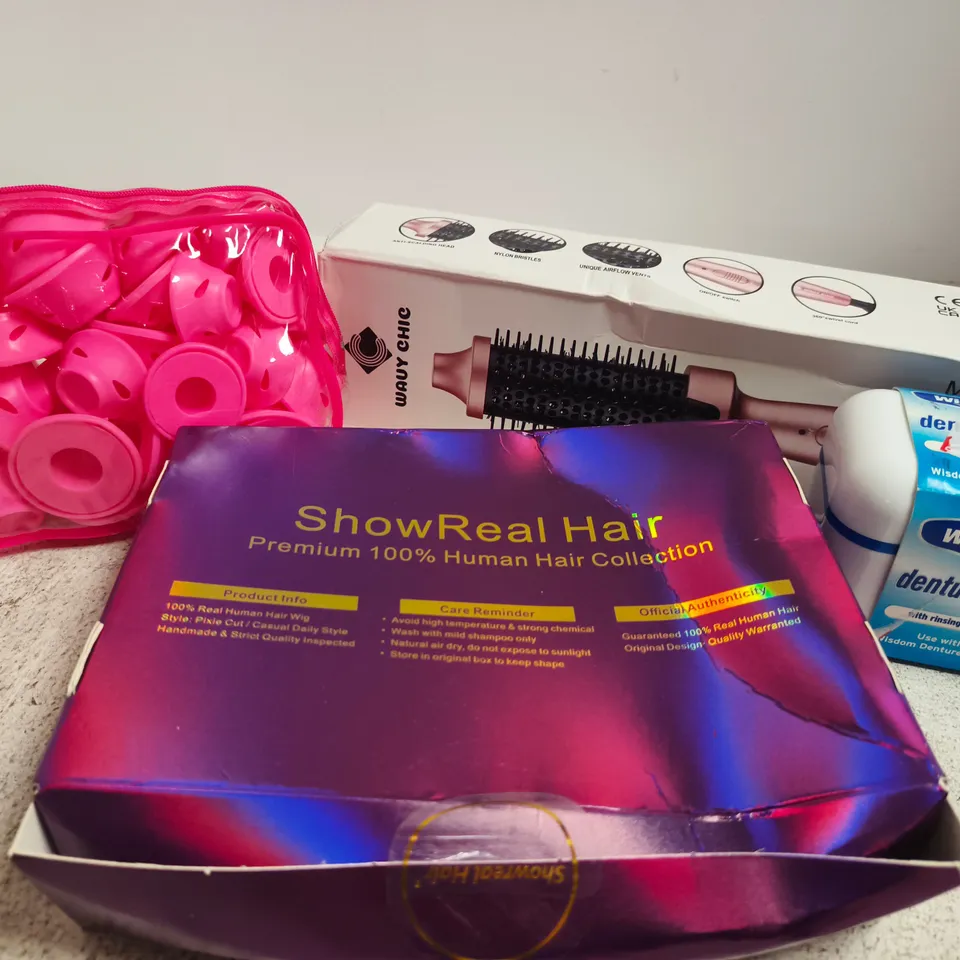 APPROX 12 ASSORTED BEAUTY PRODUCTS TO INCLUDE ROUND HAIR BRUSH, WISDOM DENTURE BATH, HAIR EXTENSION PIECES, ETC
