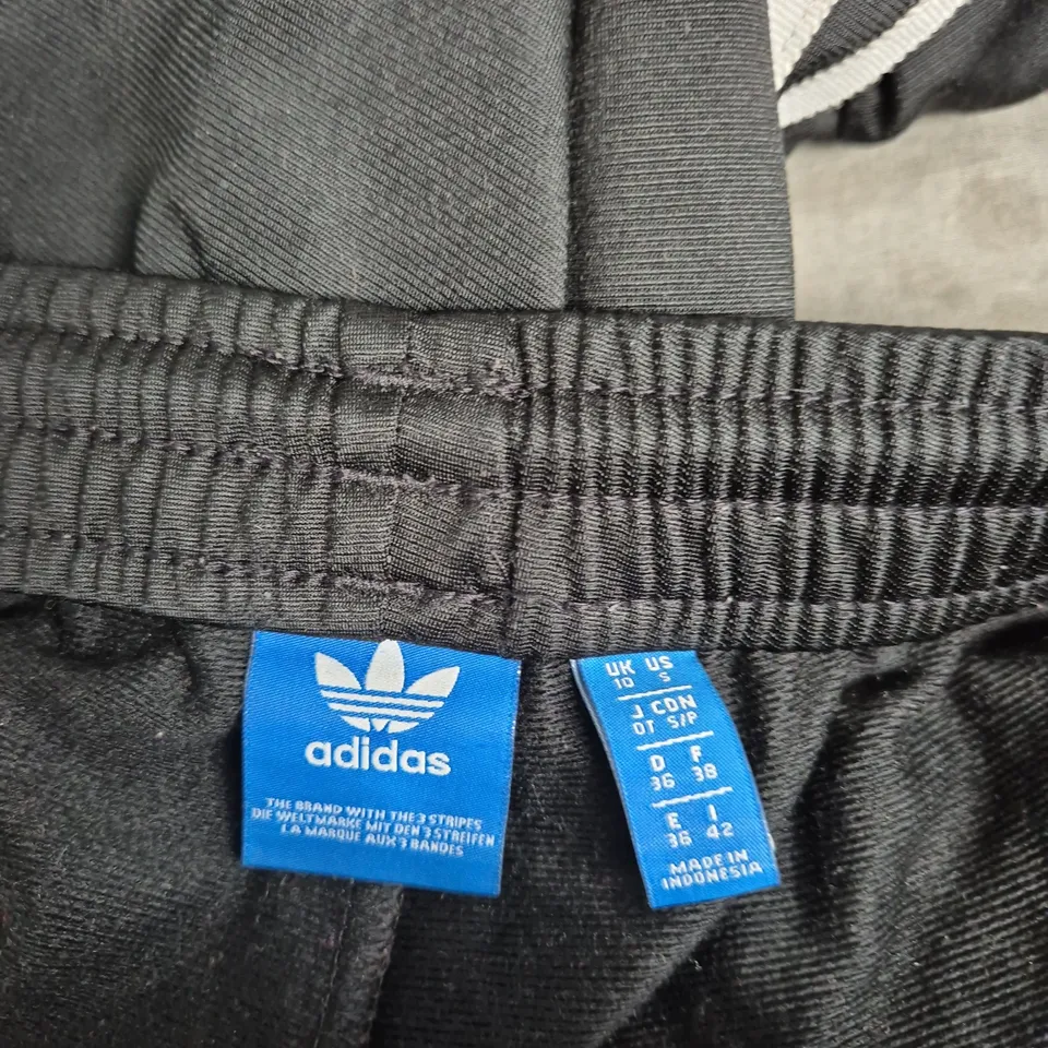 ADIDAS BLACK TRACK PANTS WITH WHITE SIDE STRIPES – UK 10