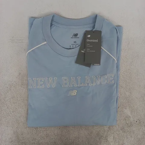 NEW BALANCE OVERSIZED SHORT SLEEVE T-SHIRT IN SKY BLUE/WHITE SIZE XS