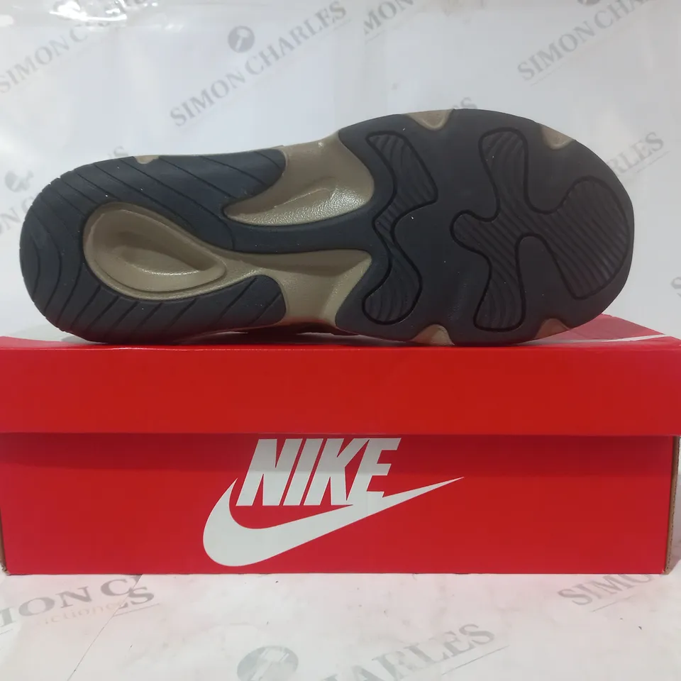 BOXED PAIR OF NIKE SHOES IN BEIGE/TEAL UK SIZE 9