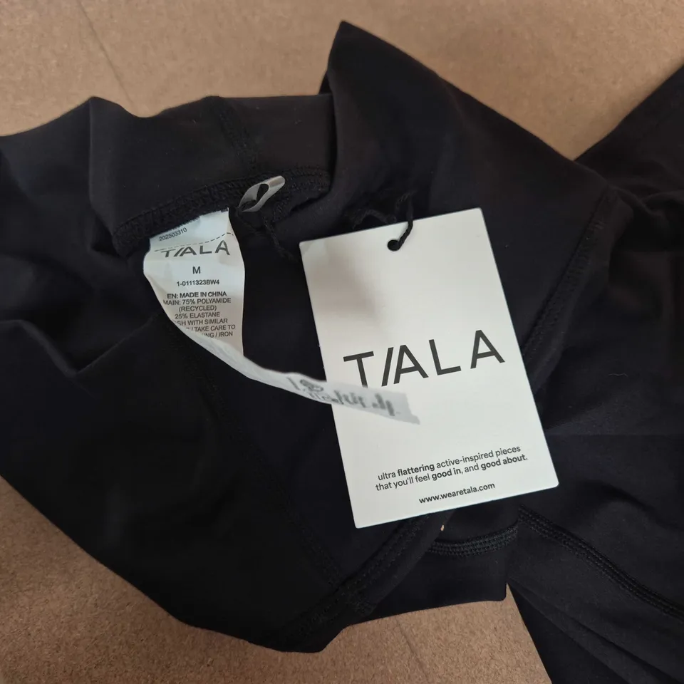 T/ALA DAYFLEX HIGH WAISTED FLARED YOGA PANTS 30INCH LEG NO FRONT SEAM IN BLACK - MEDIUM