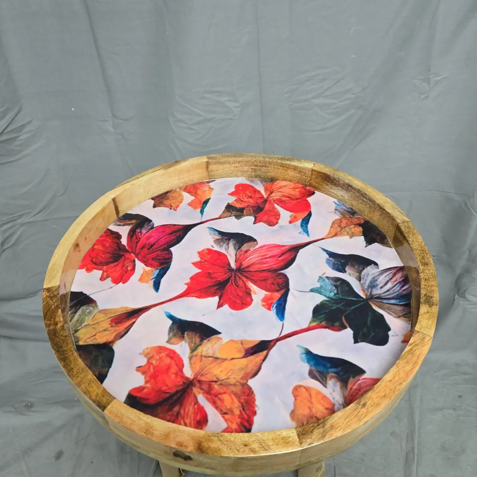 ROUND WOODEN THREE-LEGGED STOOL WITH FLORAL PRINT TOP
