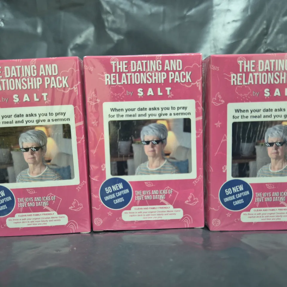 BOX OF APPROXIMATELY 100 SEALED DATING AND RELATIONSHIP PACKS FOR THE CHRISTIAN MEME GAME