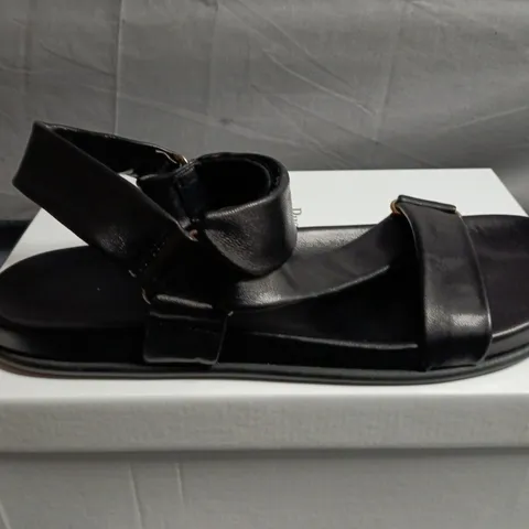 BOXED PAIR OF RUSSELL AND BROMLEY BLACK LEATHER SANDALS - SIZE 40