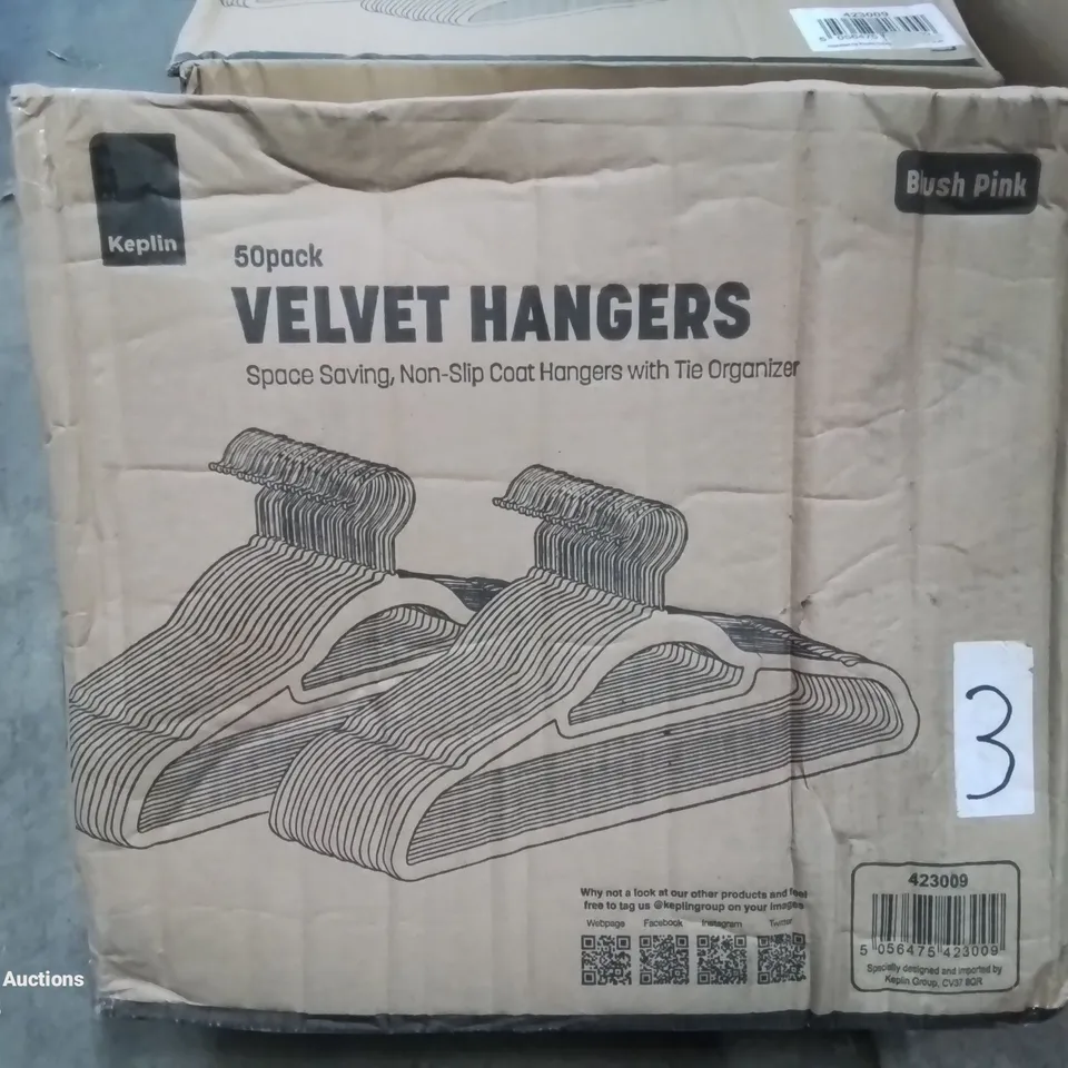 BOXED 50 PACK OF VELVET COAT HANGERS.