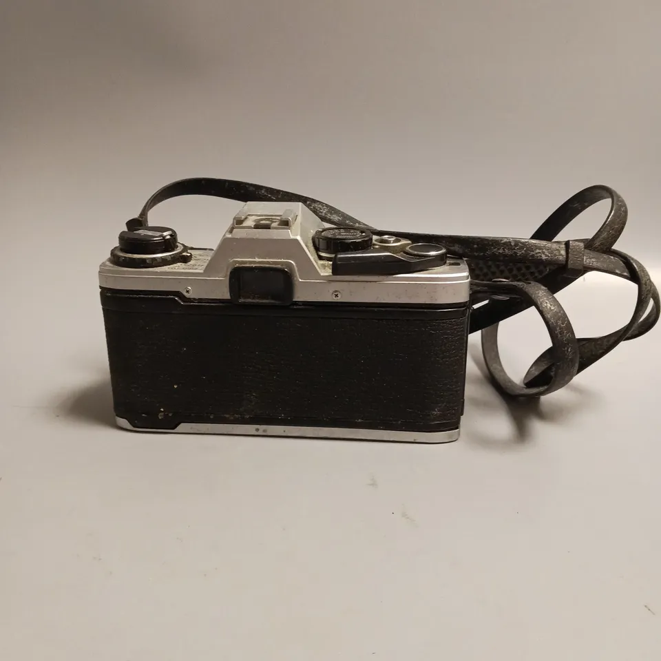 OLYMPUS FILM CAMERA OM 10 LEATHER STRAP INCLUDES MANUAL ADAPTOR