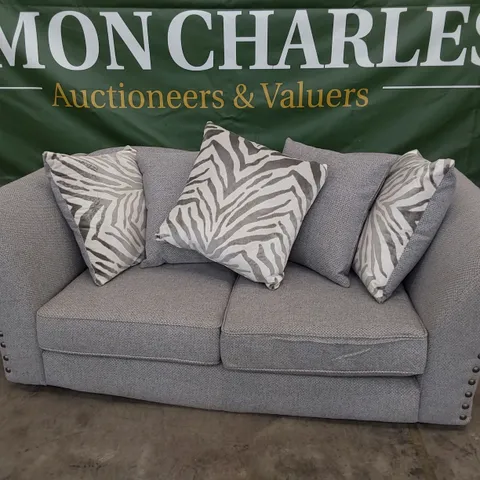 DESIGNER TWO SEATER SOFA WITH SCATTER CUSHIONS & STUDDED DETAIL