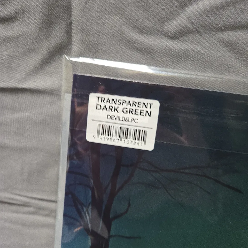 DEVILSKIN – RE-EVOLUTION VINYL LP (TRANSPARENT DARK GREEN)