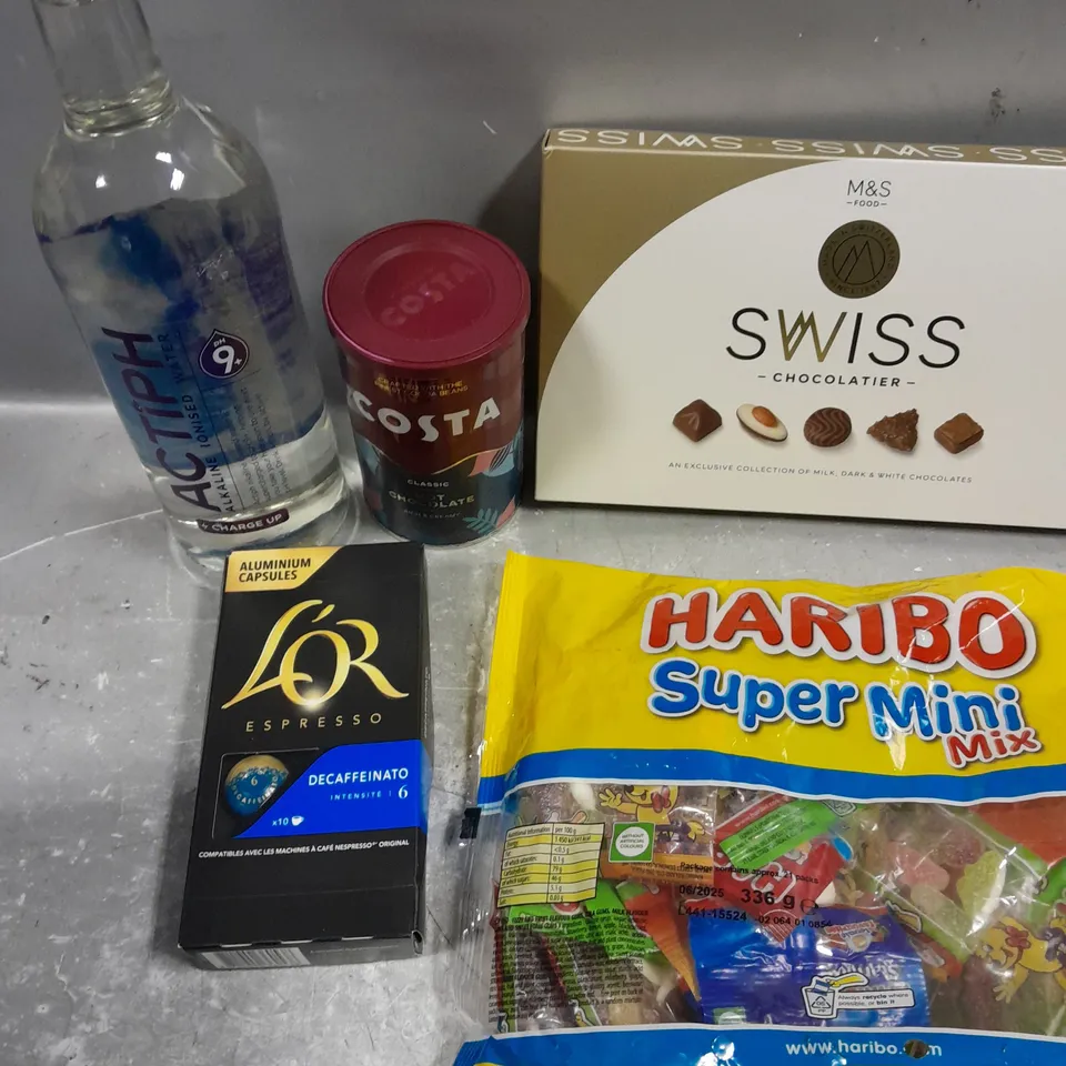 APPROXIMATELY 10 ASSORTED FOOD/DRINK PRODUCTS TO INCLUDE SWISS CHOCOLATES, HARIBO SUPERMIX, L'OR COFFEE ETC - COLLECTION ONLY 