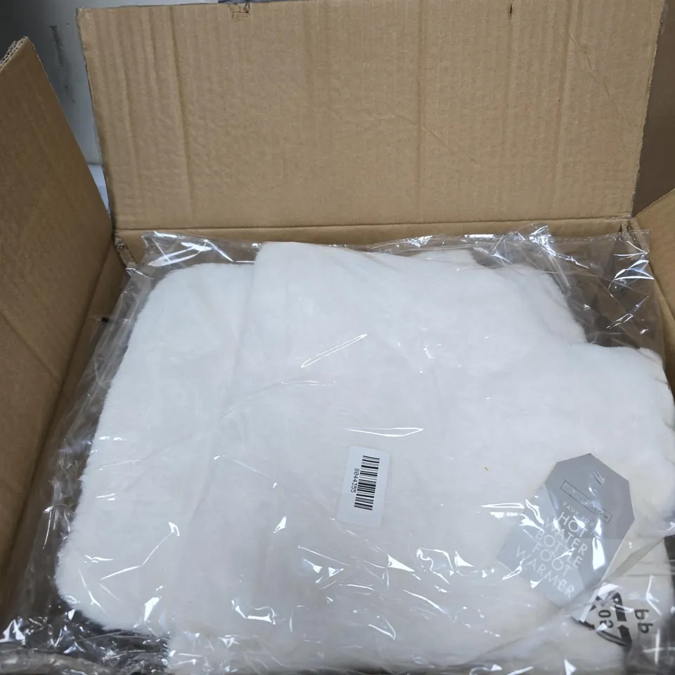 BOX OF APPROXIMATELY 12 WHITE FAUX FUR FOOT WARMER HOT WATER BOTTLES