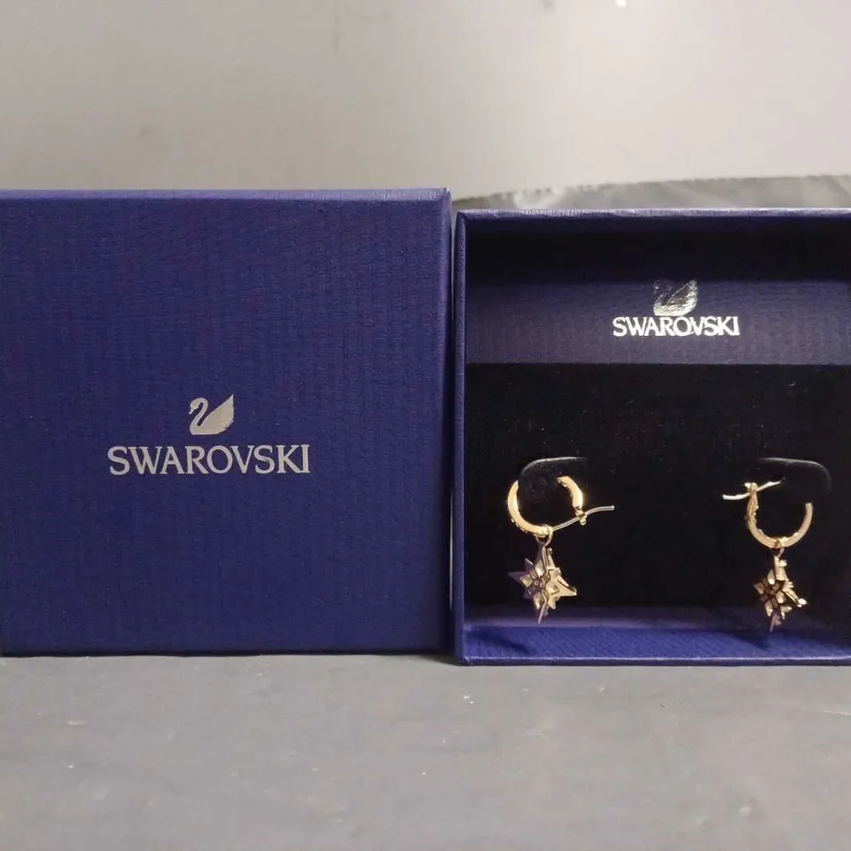 BOXED SWAROVSKI SYMBOLIC STAR SNOWFLAKE EARRINGS 