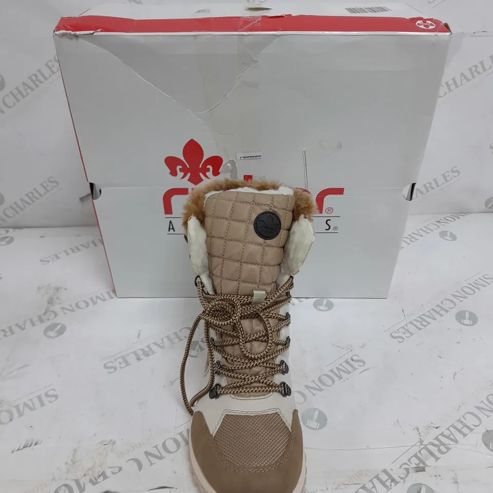 BOXED PAIR OF RIEKER CREAM WINTER FUR HIKE BOOTS IN SIZE 5 
