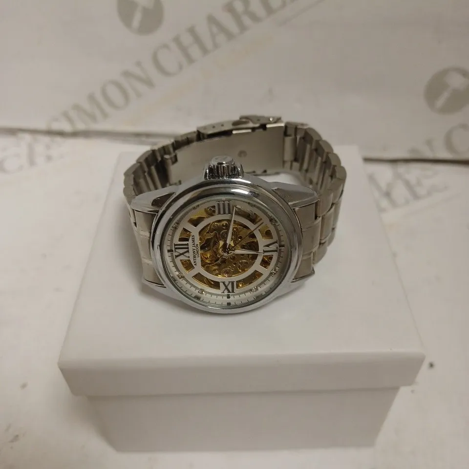 BOXED ANTHONY JAMES GENTS LIMITED EDITION SKELETON AUTOMATIC  STAINLESS STEEL WATCH - WATER RESISTANT - WITH KEY RING.