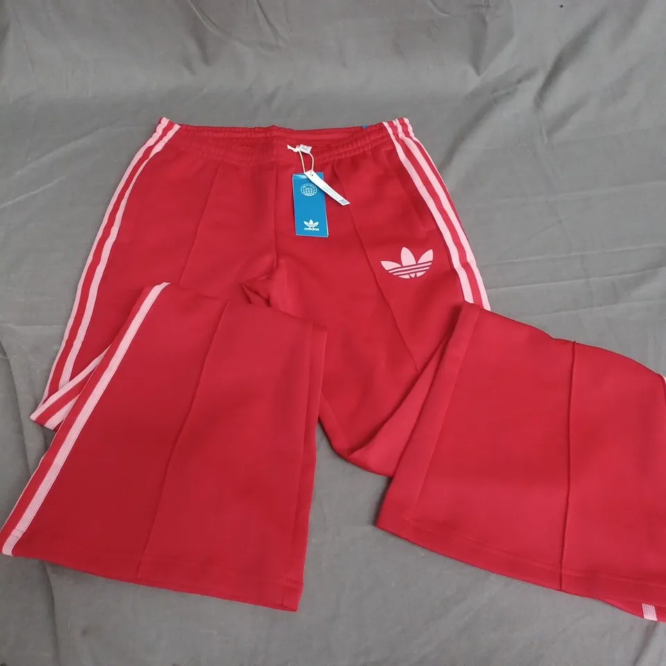 ADIDAS FLARED TRACK PANTS IN RED - UK 10