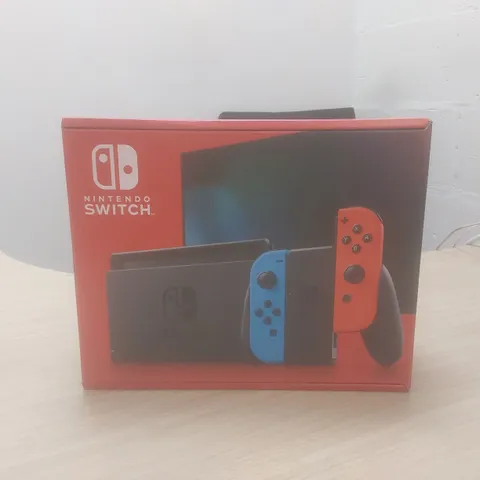 BOXED NINTENDO SWITCH 32GB - NEON RED & BLUE CONTROLLERS