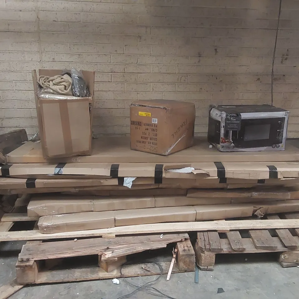 PALLET CONTAINING A LARGE QUANTITY OF ASSORTED ITEMS INCLUDING: CLOTHING, MICROWAVE, FURNITURE PARTS ECT