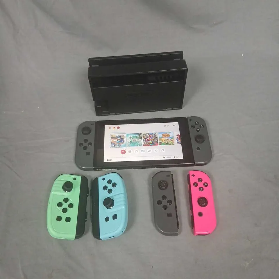 NINTENDO SWITCH CONSOLE WITH DOCK AND FOUR JOY-CON CONTROLLERS (NEON GREEN, NEON BLUE, GREY & PINK)