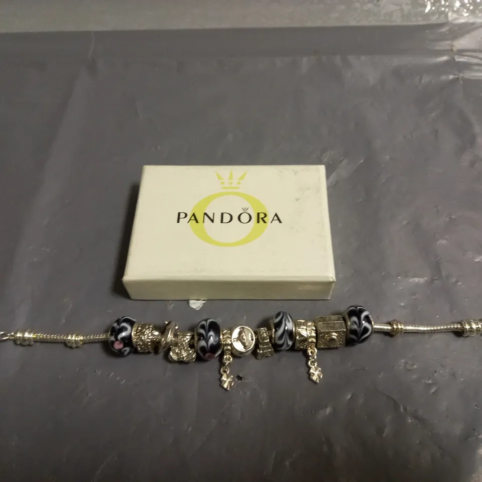 PANDORA BRACELET WITH VARIOUS CHARMS 