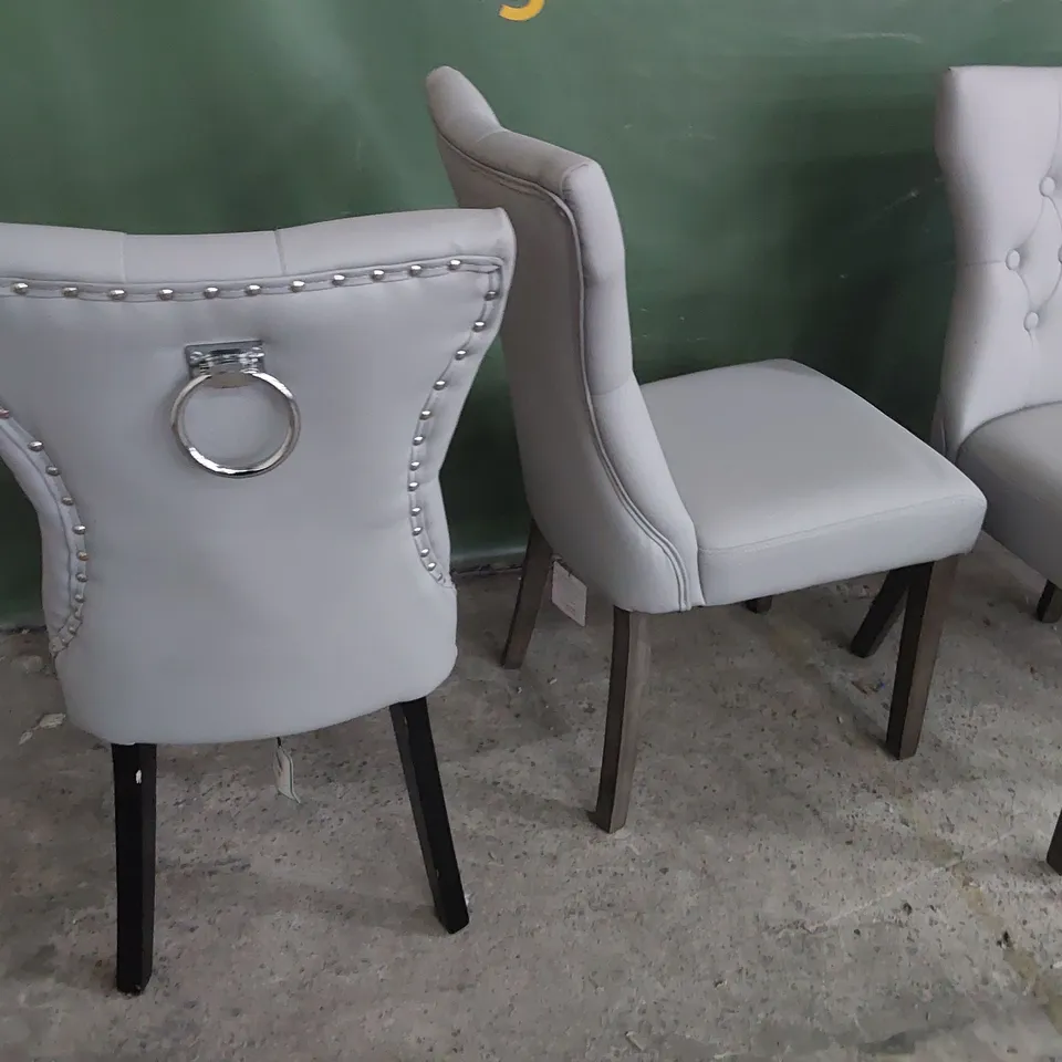 FOUR UPHOLSTERED BUTTONED BACK DINING CHAIRS GREY PU (3 PLAIN & 1 RING BACK)