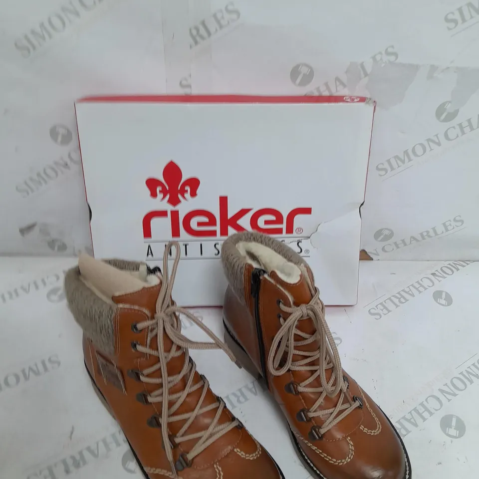 BOXED PAIR OF RIEKER WATER RESISTANT HIKING BOOTS IN BROWN ZIP UP SIZE 4