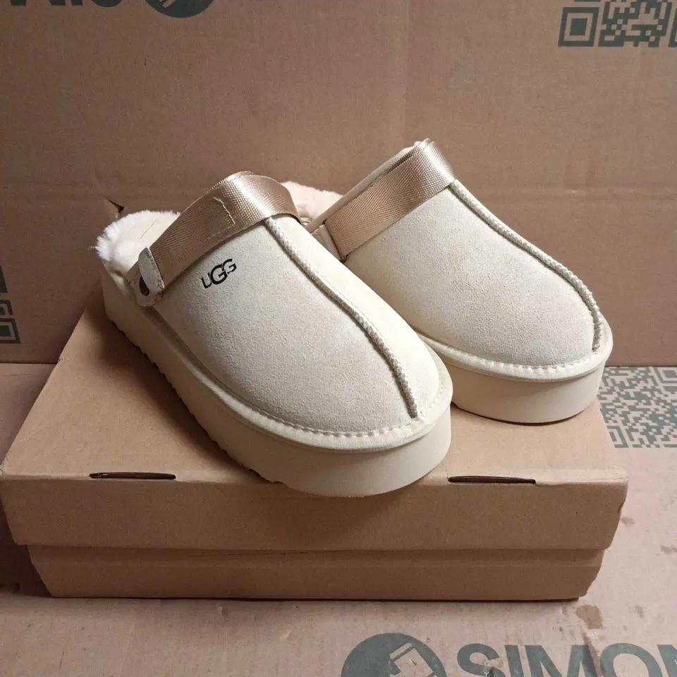BOXED PAIR OF UGG WOMEN'S SLIPPERS – LIGHT BEIGE SUEDE WITH SHEARLING LINING - UK 7