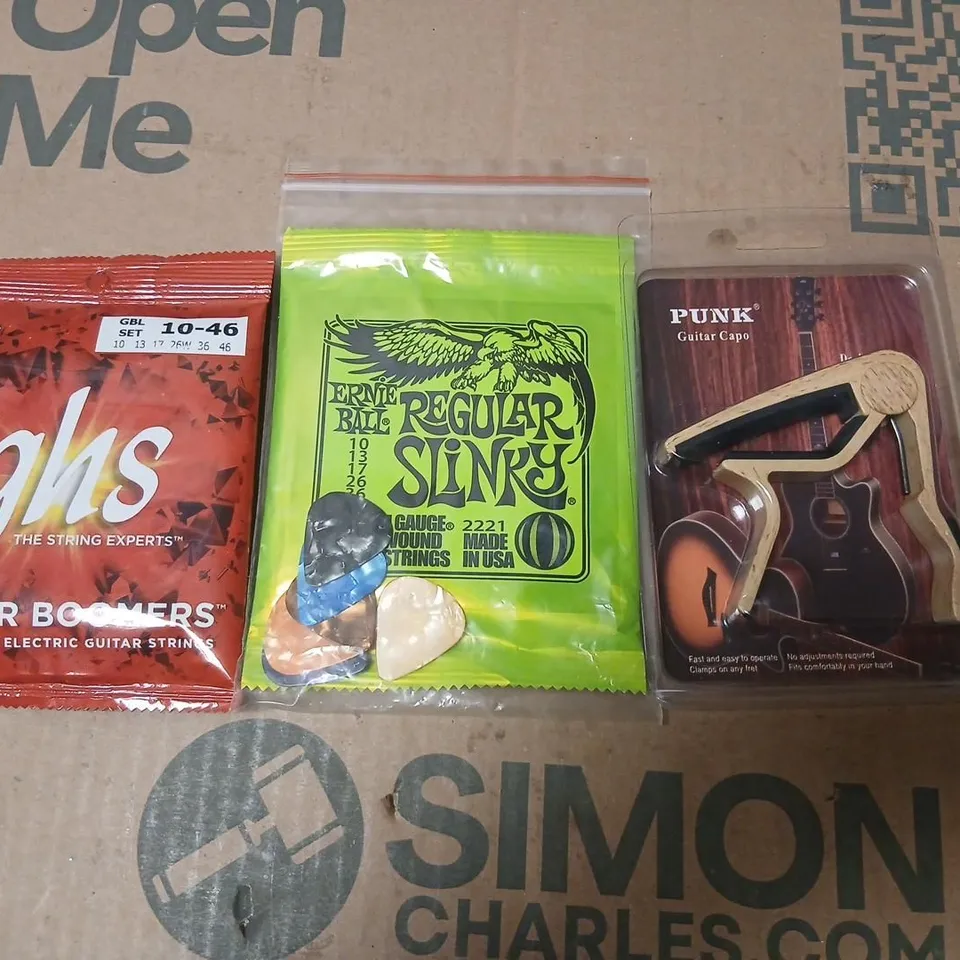 GUITAR ACCESSORIES PACK: ERNIE BALL REGULAR SLINKY STRINGS (10-46) + GHS STRINGS (10-46) + PUNK GUITAR CAPO