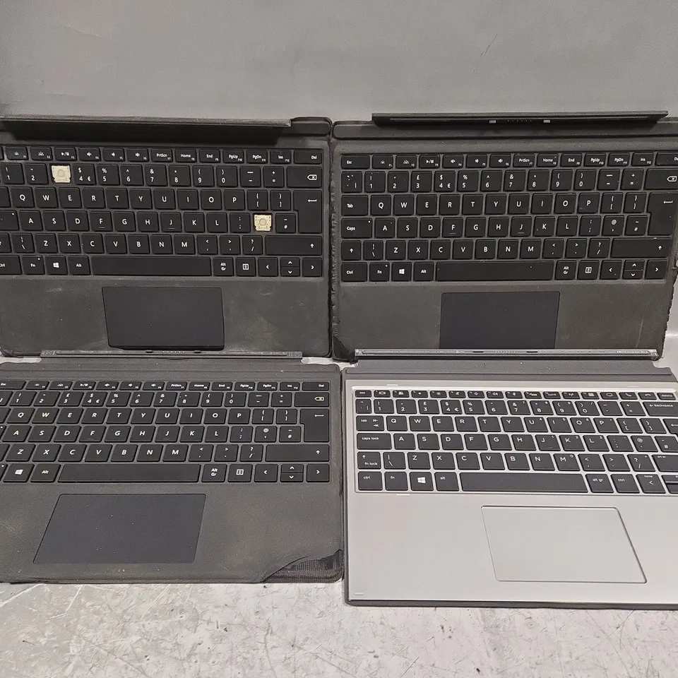 4 X ASSORTED TABLET KEYBOARD COVERS 