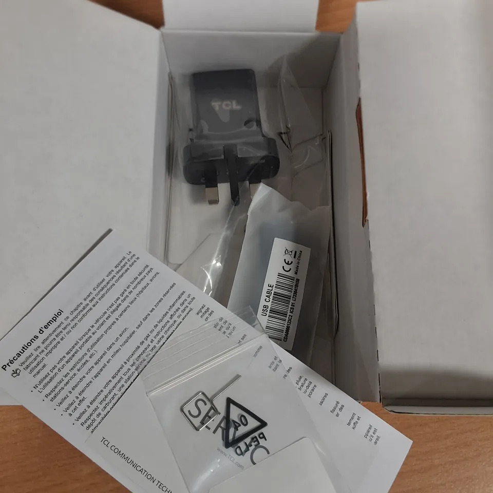 BOXED TCL 40 R5G IN STARLIGHT BLACK - T771K