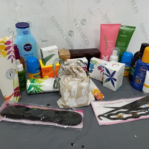 APPROXIMATELY 20 ASSORTED COSMETICS ITEMS TO INCLUDE TROPIC SOFT FOCUS FINISHING POWDER, NIVEA SUN AFTER SUN MOISTURE (400ml), LOREAL ELVIVE FRIZZ KILLER SERUM (100ml), ETC